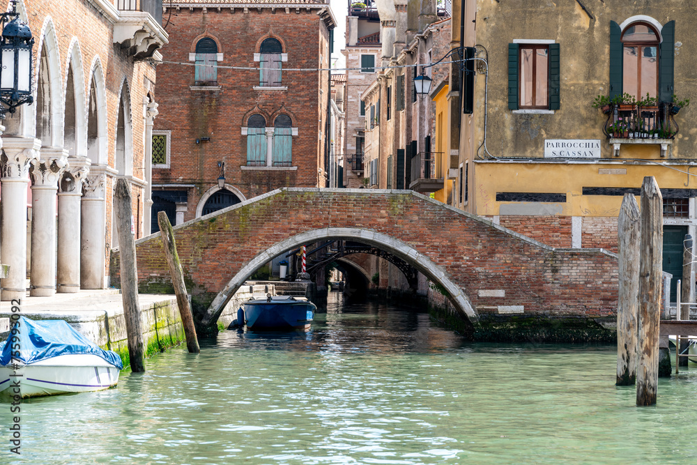 Historic Venetian Bridge Over Quiet Canal in Venice, Italy