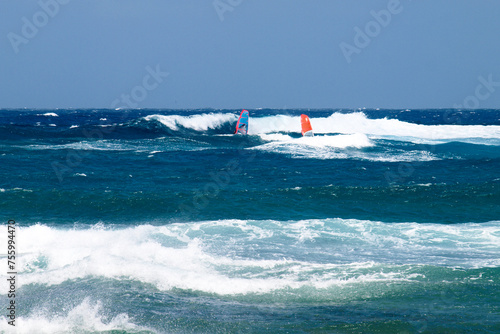 Wind surfing on the island's coast in the area of Costa Teguise