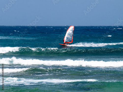 Wind surfing on the island's coast in the area of Costa Teguise