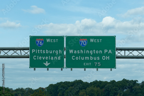 Exit 75 sign for I-70 West toward Washington PA and Columbus OH, and I-76 West toward Pittsburgh, Pennsylvania and Cleveland, Ohio
