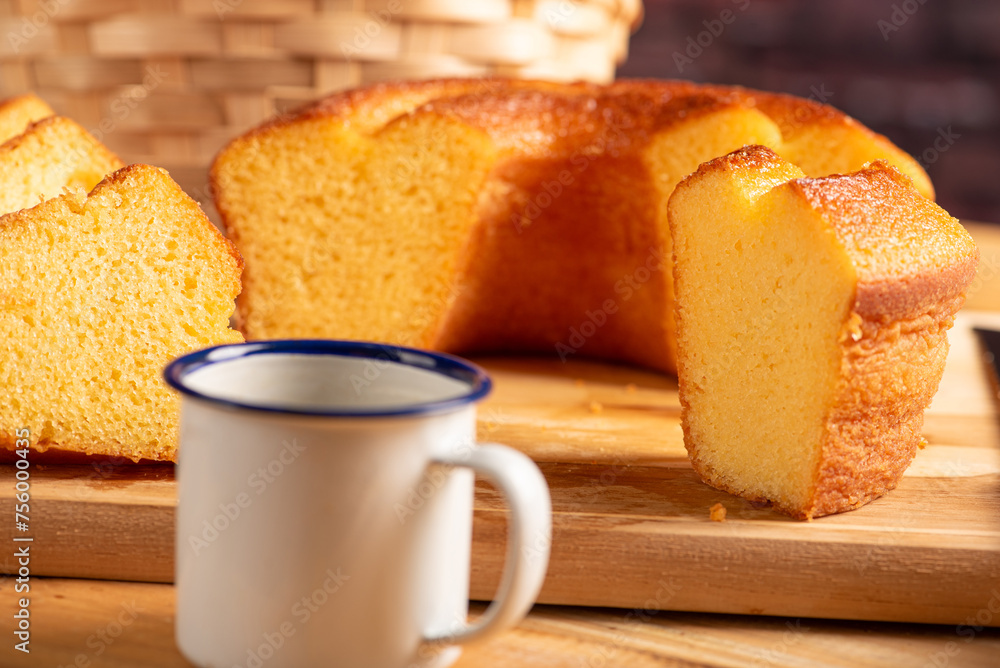 Orange cake, beautiful orange cake and accessories on rustic wooden surface, dark background, selective focus. Orange cake, beautiful orange cake and accessories on rustic wooden surface, dark background, selective focus.