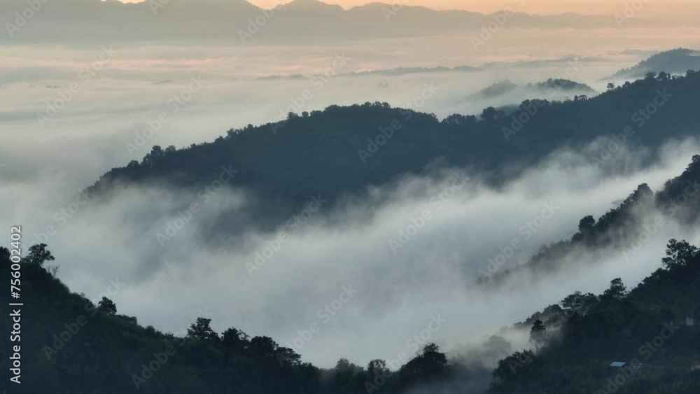 Clouds drifting over the majestic mountains in Sajek Valley, a breathtaking journey through nature's serene beauty. Timelapse, 4k Drone footage Clouds drifting over the majestic mountains in Sajek Valley, a breathtaking journey through nature's serene beauty. Timelapse, 4k Drone footage