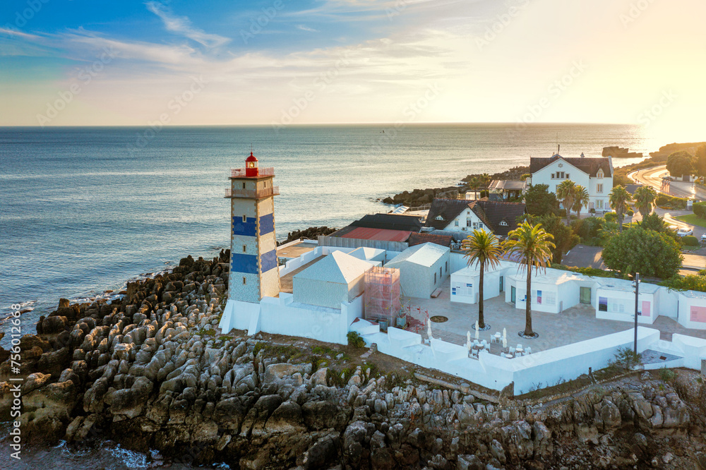 Aerial shot of Santa Marta lighthouse and seascape, Cascais, Portugal