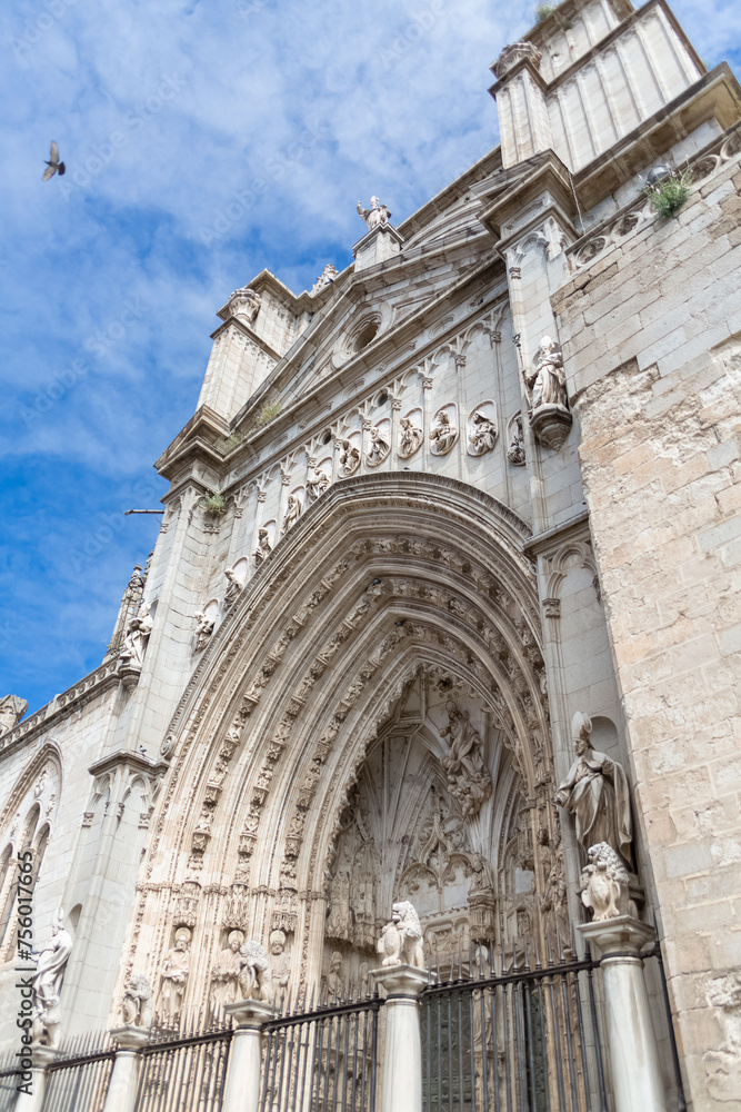 Detailed view at the gothic monument building, lateral facade with ornaments, Primate Cathedral of Saint Mary of Toledo