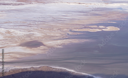 Lake Manly forming in Badwater Basin after heavy rains in Death Valley National Park. Salt flats, snowcapped mountains,  and desert valley views seen from Dante's View.