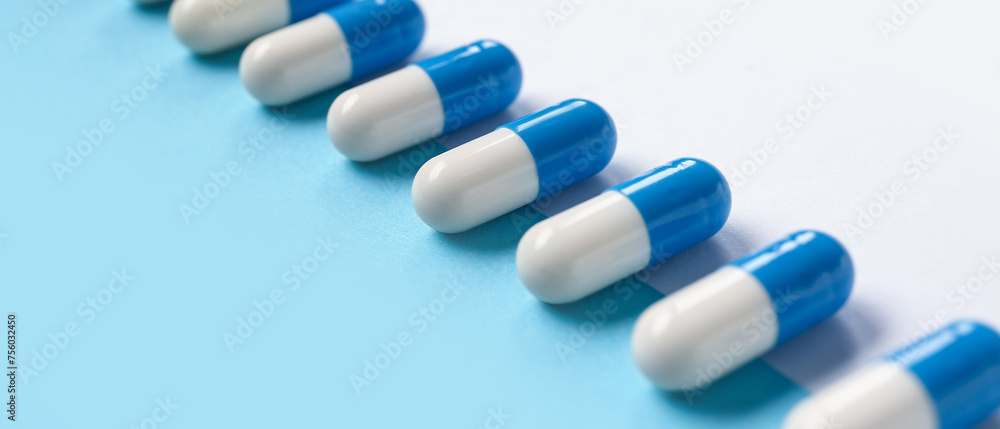 Many pills on colorful background