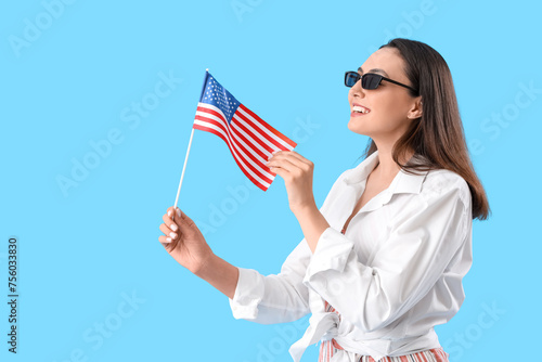 Young woman with USA flag o...