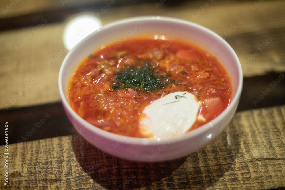 Borscht with sour cream. Greens in soup. Russian borscht. Borscht with sour cream. Greens in soup. Russian borscht.