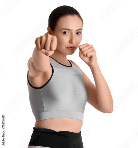 Young woman training on whi...