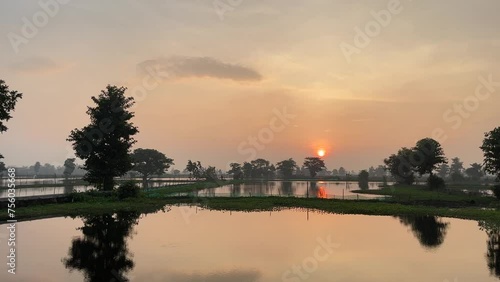 Sunrise over the fishpond. Lake in the morning.