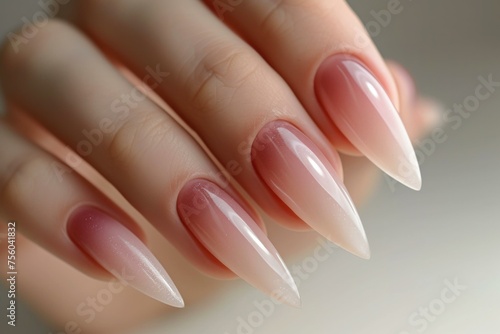A woman s hand with long nails with pink and white polish. Generative AI.