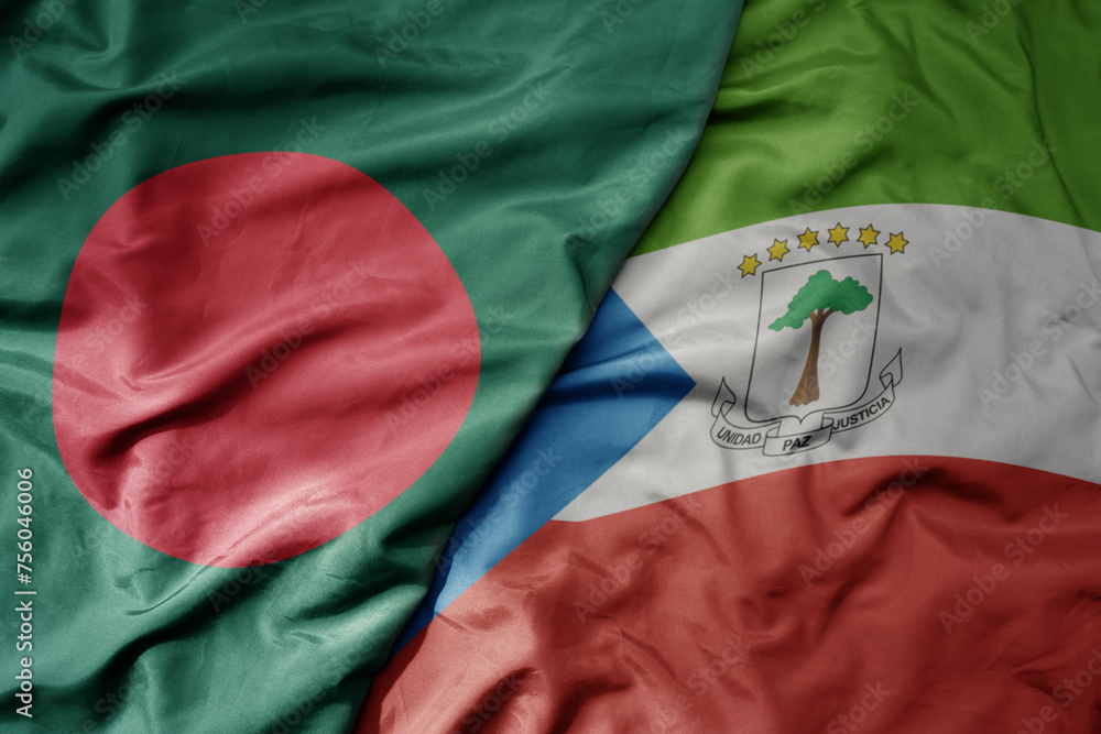 big waving national colorful flag of equatorial guinea and national flag of bangladesh.