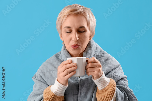 Mature woman with plaid and...