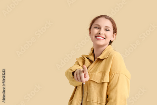 Smiling young redhead woman...