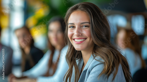 Confident young professional young business woman enjoying team meeting at work, bright smile, beautiful teeth