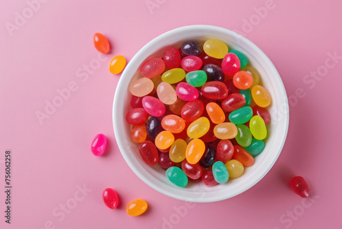Bowl of Colorful Jelly Beans on a Pink Background