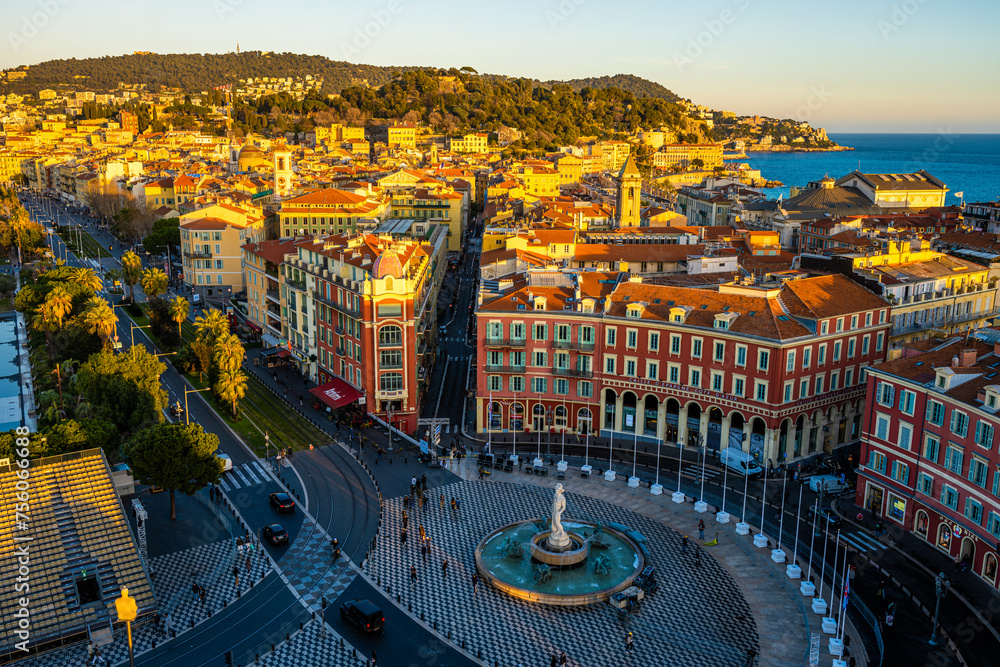 Obraz premium Warm Sunset Light Bathing the Historic City Center of Nice, France