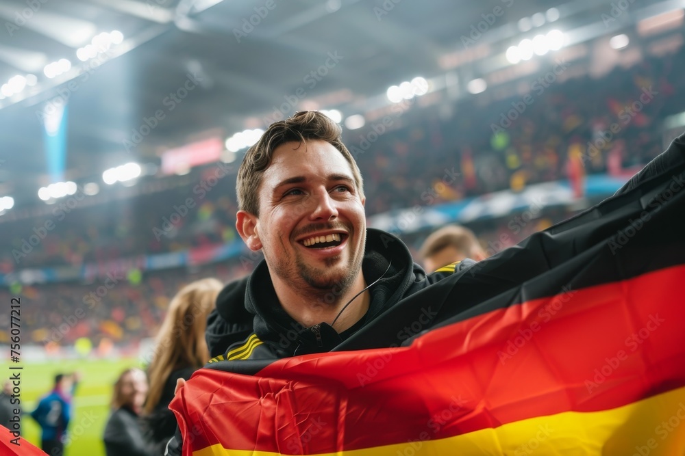 Happy German fan at stadium with flag - obrazy, fototapety, plakaty 