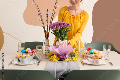 Woman preparing beautiful E...