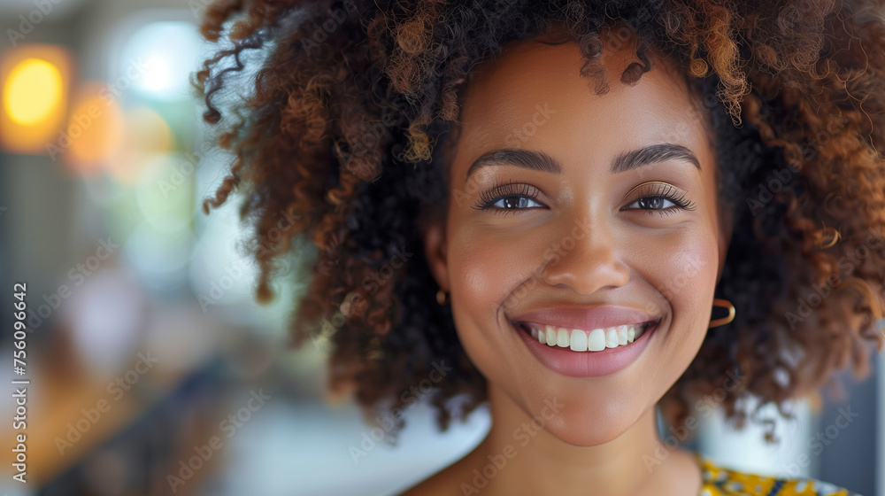 A close-up in a cozy cafe with soft lighting portrays a young woman with curly hair, smiling warmly, her joyful expression reflecting a moment of entrepreneurial success. A close-up in a cozy cafe with soft lighting portrays a young woman with curly hair, smiling warmly, her joyful expression reflecting a moment of entrepreneurial success.