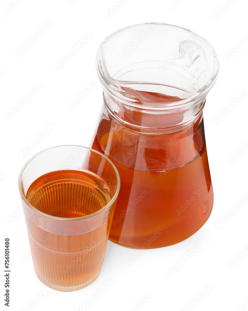 Tasty kombucha in glass and jug isolated on white Tasty kombucha in glass and jug isolated on white