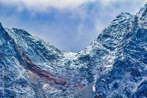 View of the challenging Cho La Pass,5420 meters which trekkers ascend to traverse between the Gokyo valley and the Khumbu valley and presents a significant challenge on the Everest base camp journey photo