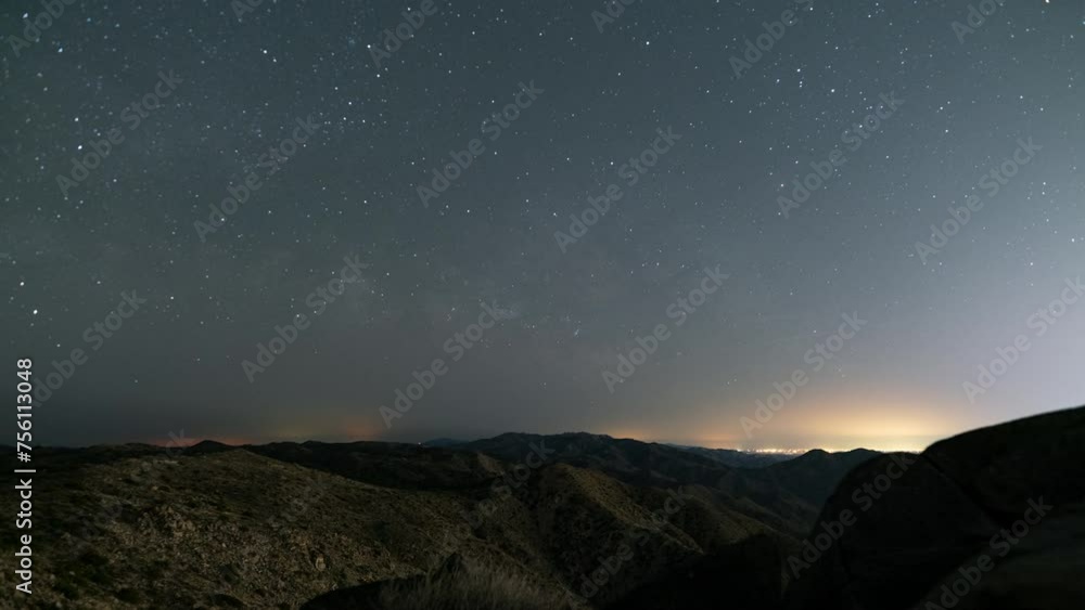 Timelapse of Milky Way galaxy rising over Coachella Valley in Joshua Tree National Park, California Timelapse of Milky Way galaxy rising over Coachella Valley in Joshua Tree National Park, California