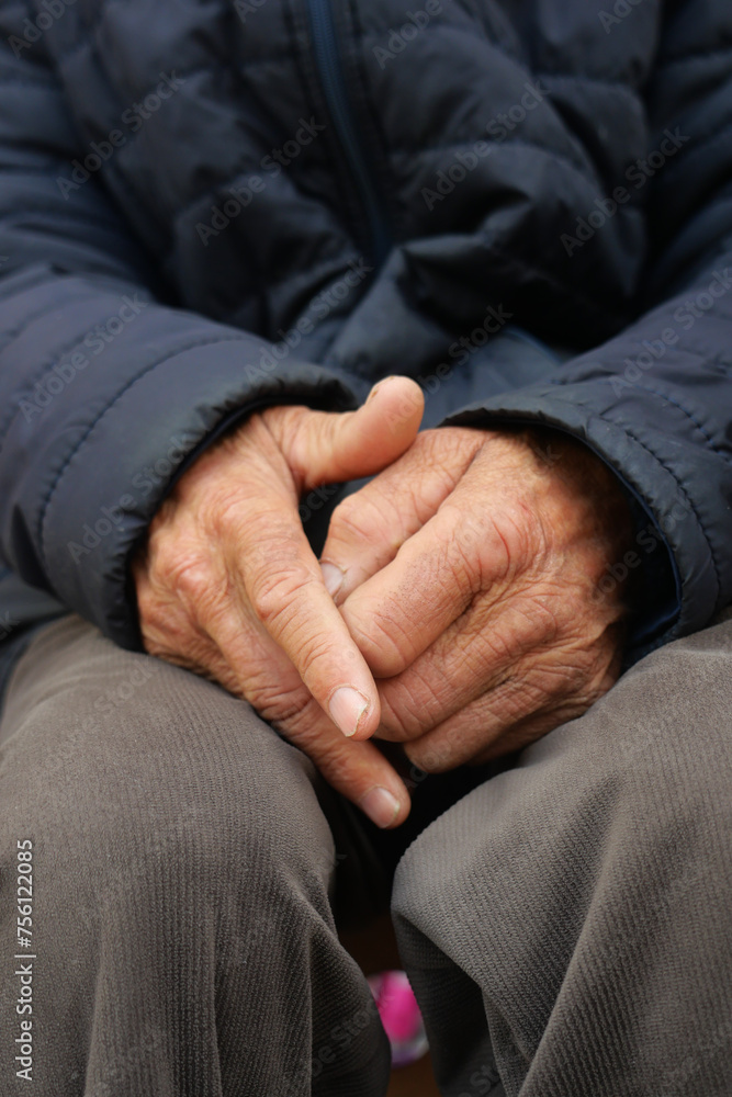 Fototapeta premium close up of hands of a elderly person