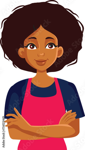 Restaurant Worker of African Ethnicity Standing with Arms Crossed. Cheerful hypermarket employee having a welcoming smile 
