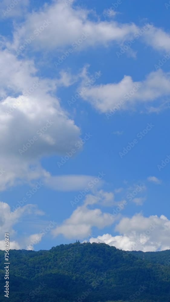 Beautiful summer day sky with fluffy white clouds time lapse in bright blue atmosphere. Beautiful summer day sky with fluffy white clouds time lapse in bright blue atmosphere.