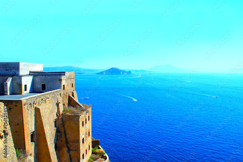 ISOLA DI PROCIDA, ITALY - SEPTEMBER 10, 2023: Palazzo d'Avalos and Tyrrhenian Sea. It was built by Cardinal Innico d'Avalos to fortify the island, which had been marred by raids of Saracen pirates