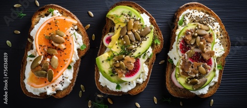 Three slices of toast topped with various ingredients on a dark table, showcasing a delicious finger food option. A comforting and versatile dish made from baked goods and terrestrial plant produce