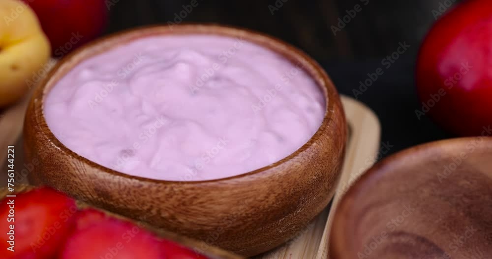 add chia seeds to fresh milk yogurt with peach slices , creamy sourdough yogurt with ripe peach slices add chia seeds to fresh milk yogurt with peach slices , creamy sourdough yogurt with ripe peach slices