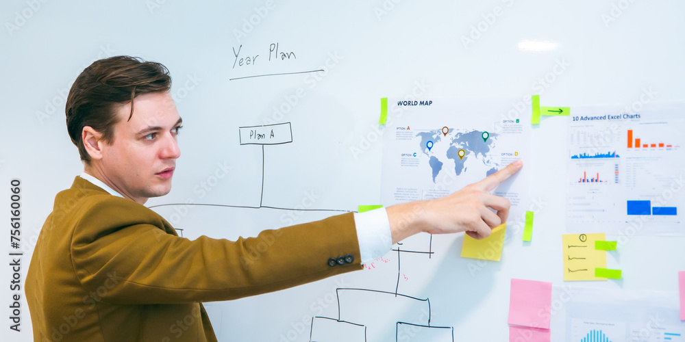 business team meeting with stats and review graphs of company target, goals or market research with data analysis. Above, table or paperwork report of growth, progress or startup performance analytics business team meeting with stats and review graphs of company target, goals or market research with data analysis. Above, table or paperwork report of growth, progress or startup performance analytics