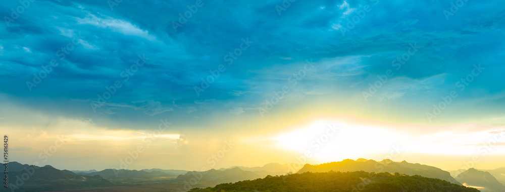 Enjoy panoramic views of the skyline . Sunset in the evening sky with colorful clouds and beautiful cloud patterns Amidst the soft golden light	
