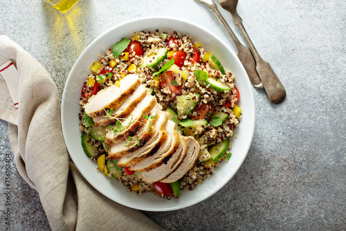 Fresh quinoa tabbouleh salad with grilled chicken photo