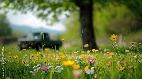 Spring flowers dot the grass with a tree trunk in the background, showcasing natural beauty. Ai Generated.