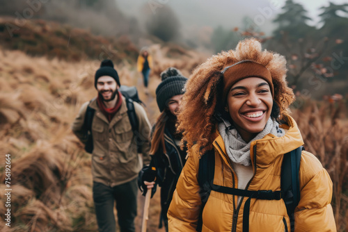 Group of young friends hiking in countryside