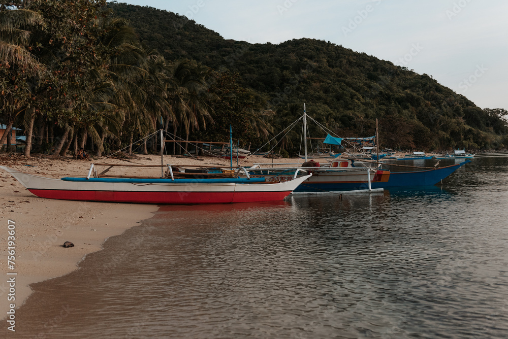 Boats on the waters edge in the Philippines Boats on the waters edge in the Philippines