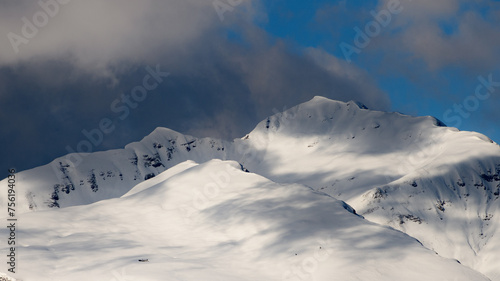 Cuds over snow mountains