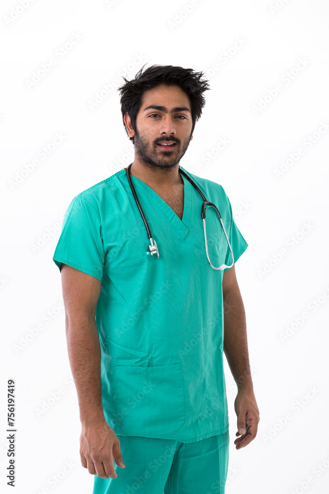 Male Indian doctor wearing a Green Scrubs. Male Indian doctor wearing a Green Scrubs.