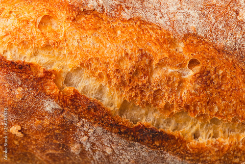 Bilde på lerret Ruddy crust of bread as an abstract background. Texture