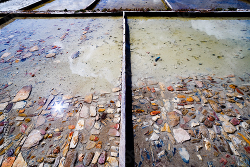 Reflection of the sun on the Pinilla salt flats photo