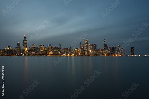 Chicago skyline at dusk, as seen from across Lake Michigan.