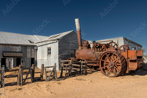 Rusted old tractor and woolshed