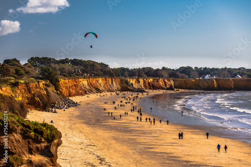 Fototapeta Naklejka Na Ścianę i Meble -  Gold Mine Beach. The famous Mine d'Or beach in Penestin, Brittany. The sun hits the cliffs and gives it its golden appearance.