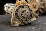 Old worn out diesel engine starter, view from the working part