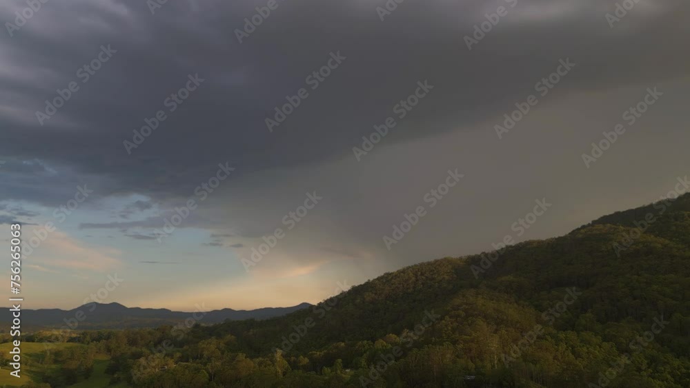 Watching Rain Clouds Roll In Over Golden Horizon Watching Rain Clouds Roll In Over Golden Horizon