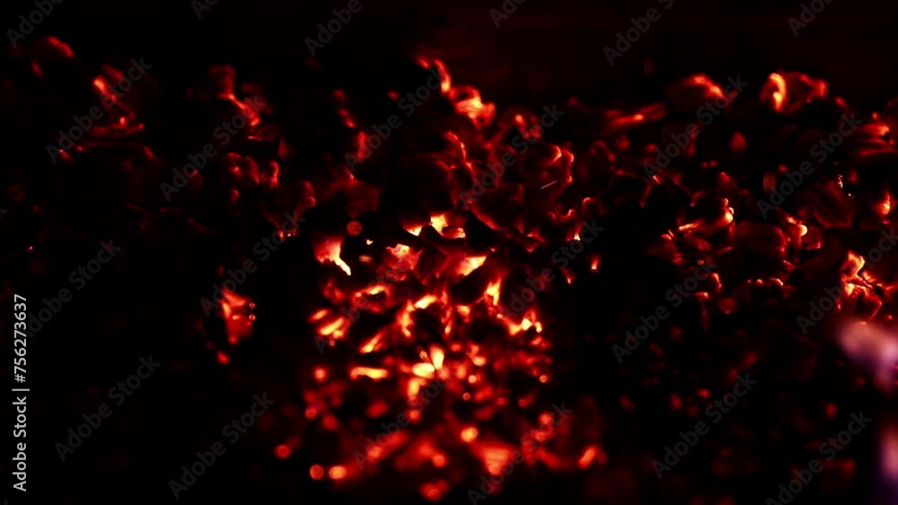 Flying Embers from fire. Burning hot bonfire sparks. Fire Particles over black background with smoke. Torch fire, camp fires, fire and flames. Flying Embers from fire. Burning hot bonfire sparks. Fire Particles over black background with smoke. Torch fire, camp fires, fire and flames.