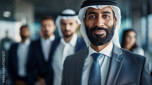 Smiling Arab Businessman Leading Team